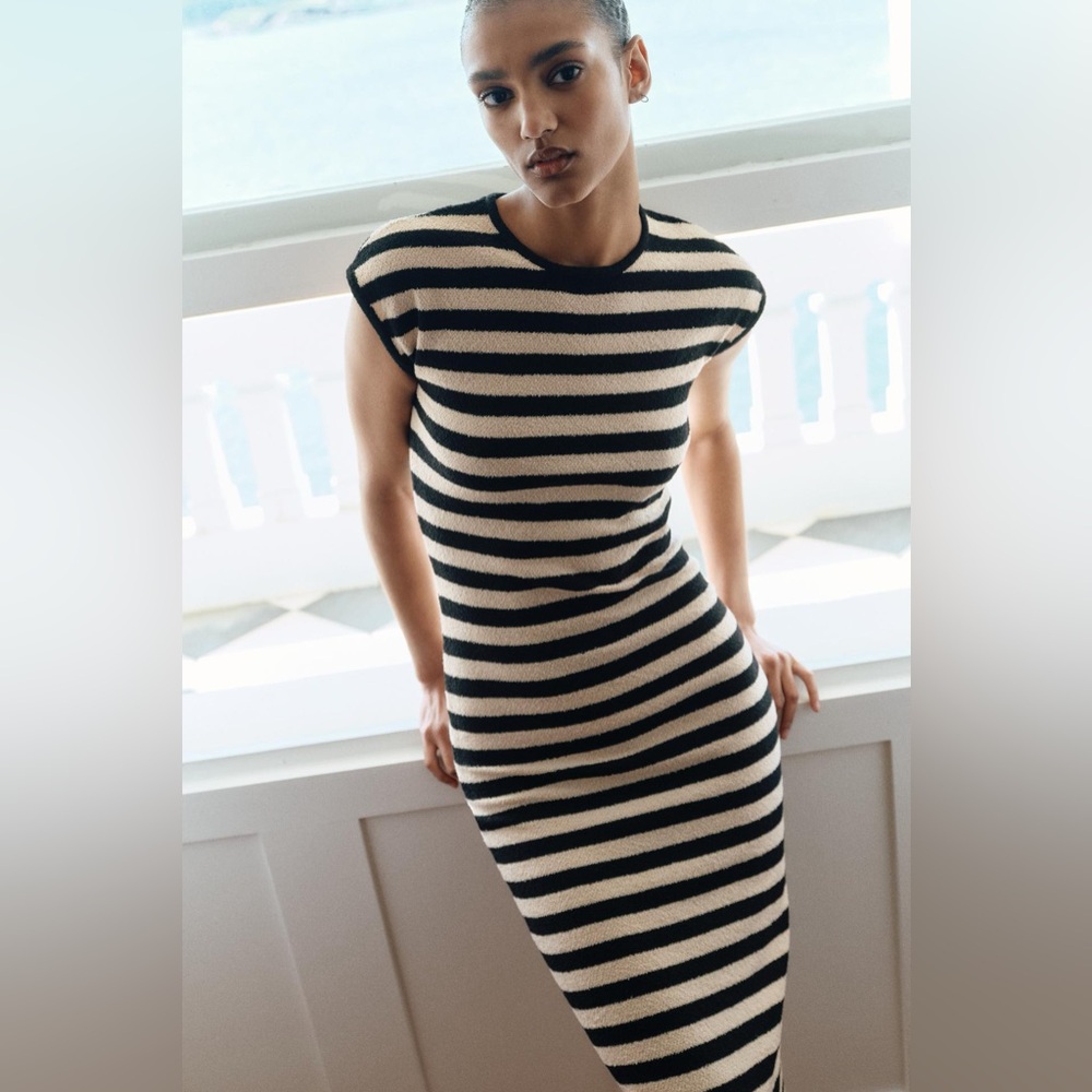 Zara sleeveless knit midi dress. 
Striped Black and cream Dress